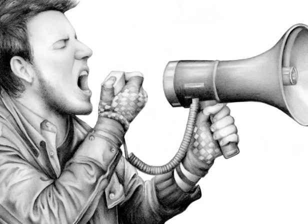 Young Man Shouting With Megaphone